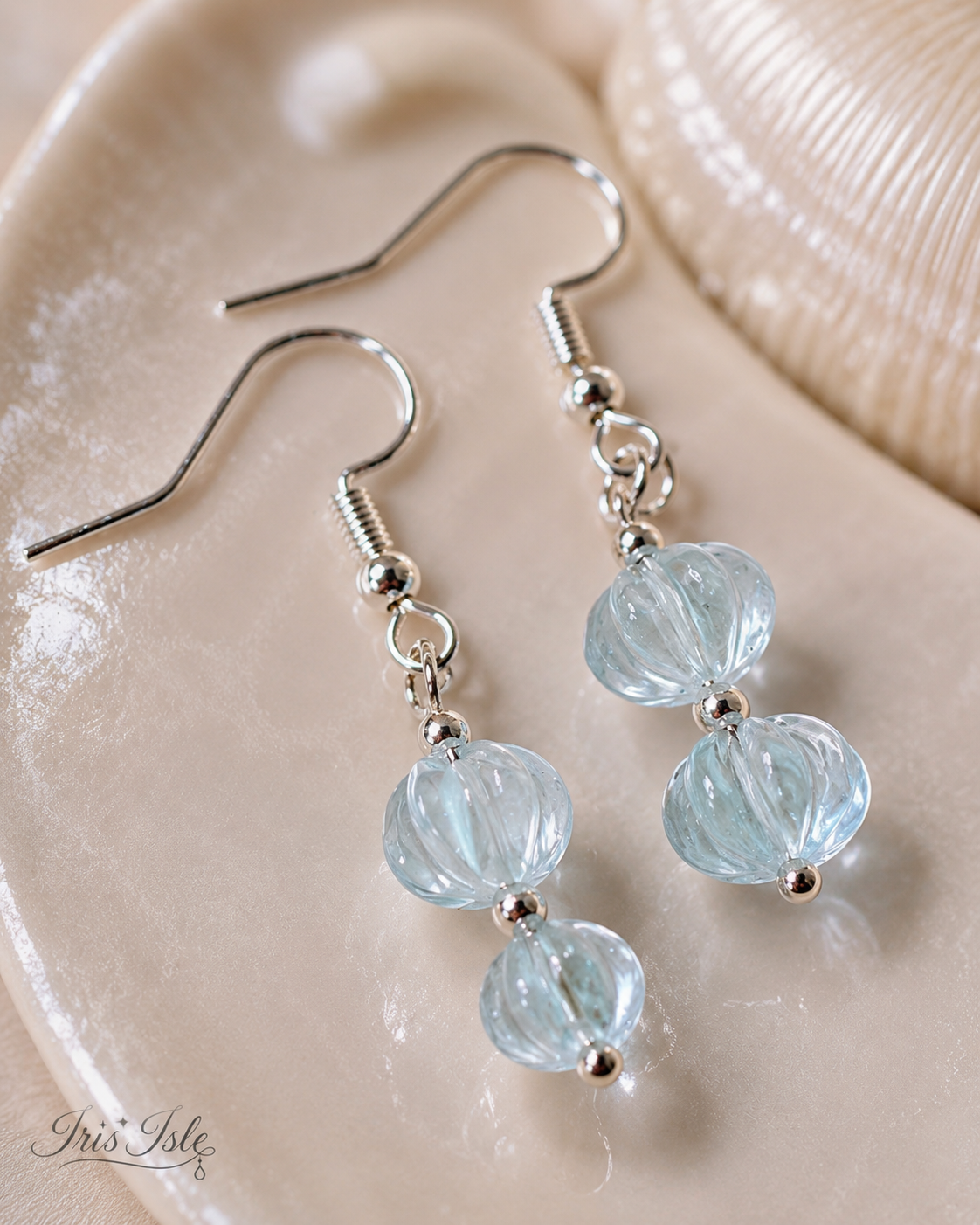 Pale blue carved lantern drop earrings