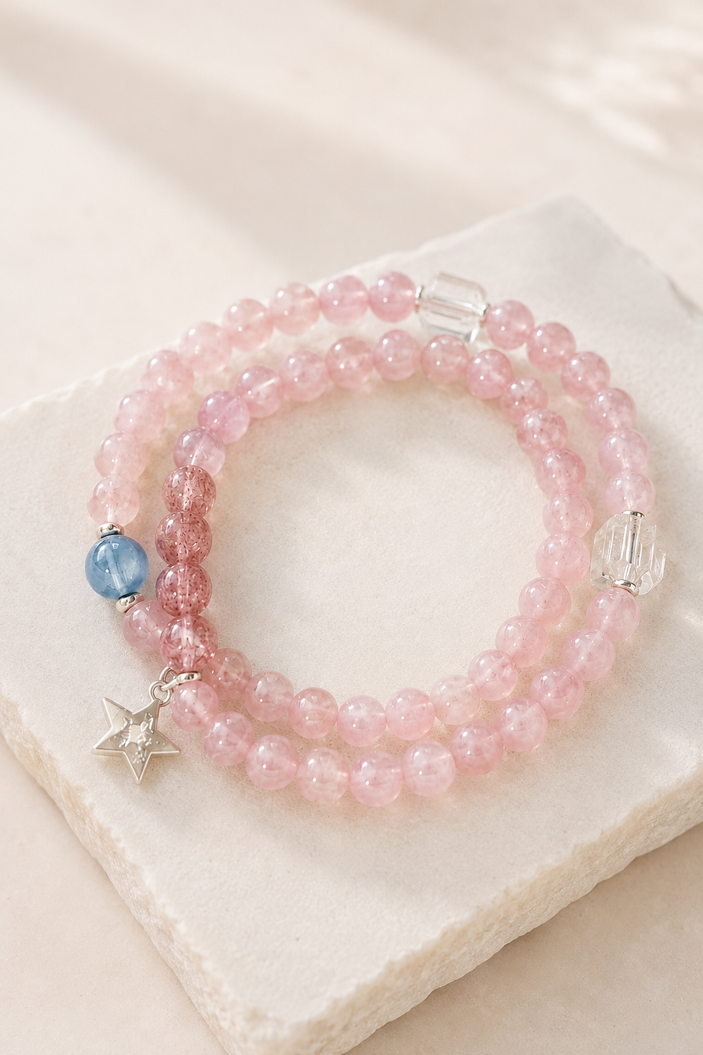 Rose quartz beaded bracelet with star charm
